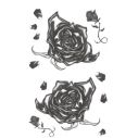 Flot kunstig tatovering med sorte roser.